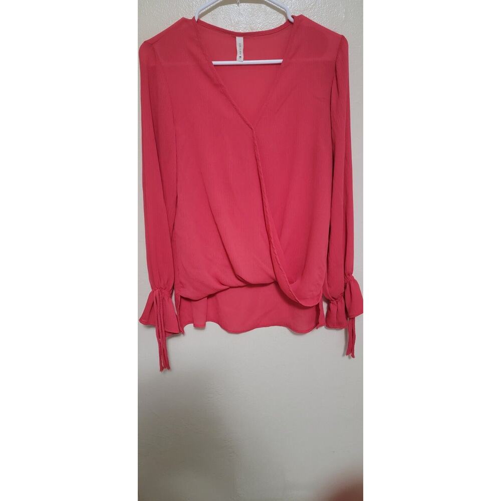 TYCHE ORNAGE BLOUSE SIZE M WITH CUTE DETAILES ON ITS LONG SLEEVES